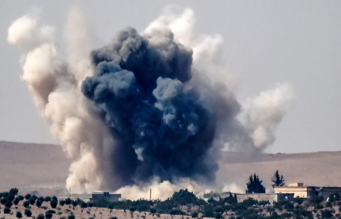 Turkish Syrian border city of Karkamis in the southern region of Gaziantep on Wednesday shows smoke billowing following airstrikes by a Turkish Army jet fighter on the Syrian Turkish border village of Jarabulus during fighting