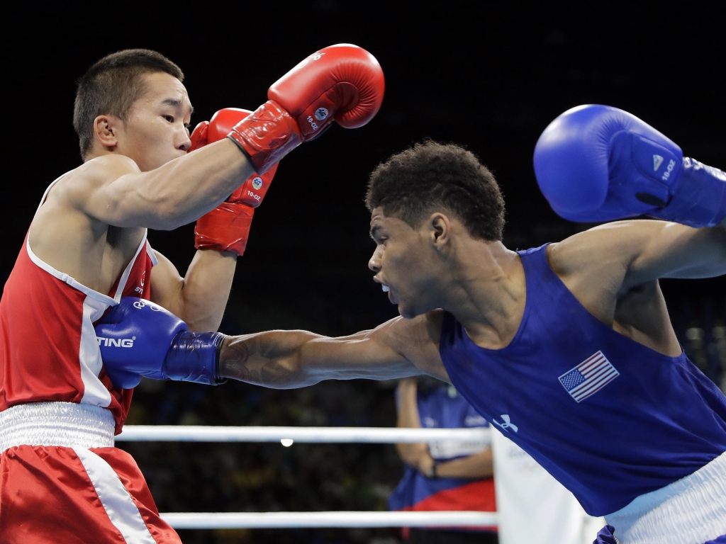 Shakur Stevenson of the U.S. fights Mongolia's Tsendbaatar Erdenebat in their bantamweight 56-kg quarterfinals match in Rio de Janeiro Tuesday. Stevenson won the bout by unanimous decision