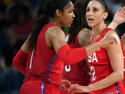 USA guard Diana Taurasi and Maya Moore made the difference against France on Thursday