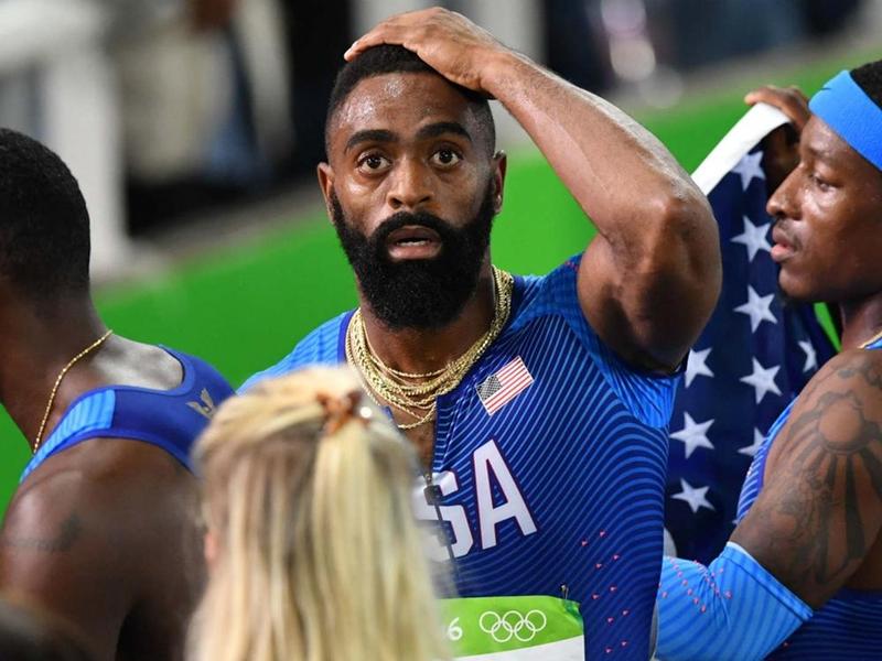 After finishing third in Friday's final America's 4x100m team members were in the midst of a lap of honor around the stadium on Friday when they learned they had been disqualified