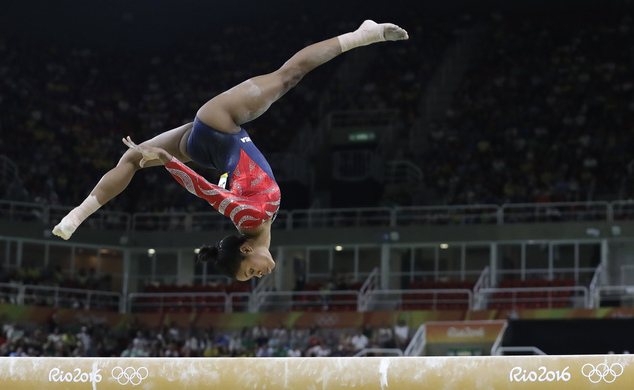 United States Gabrielle Douglas performs on the balance beam during the artistic gymnastics women's qualification at the 2016 Summer Olympics in Rio de Jane