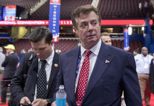 Trump campaign chairman Paul Manafort walks around the convention floor before the opening session of the Republican National Convention in Cleveland. Manafort resigned in wake of campaign shakeup and revelations