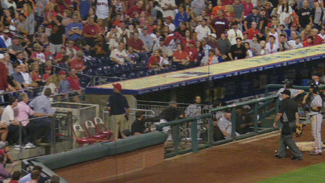 WATCH: Umpire ejects fan, much to the approval of almost everyone nearby