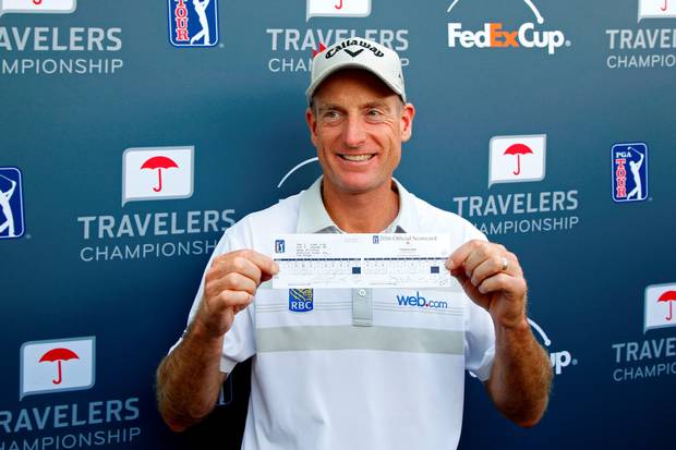 Unique Jim Furyk with his record-breaking scorecard