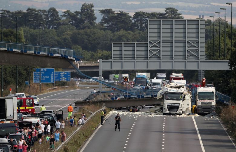 M20 to remain closed overnight after digger on lorry brings down footbridge