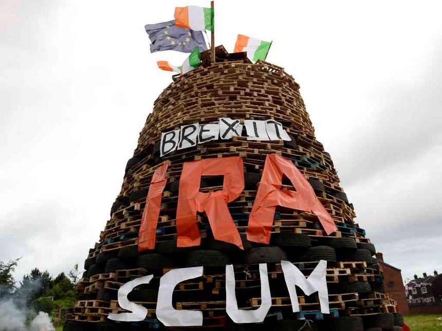 A bonfire pyre with the words 'BREXIT IRA SCUM&#039 is seen in Tiger's Bay ahead of the Twelfth of July celebrations held by members of the Orange Order in Belfast Northern Ireland