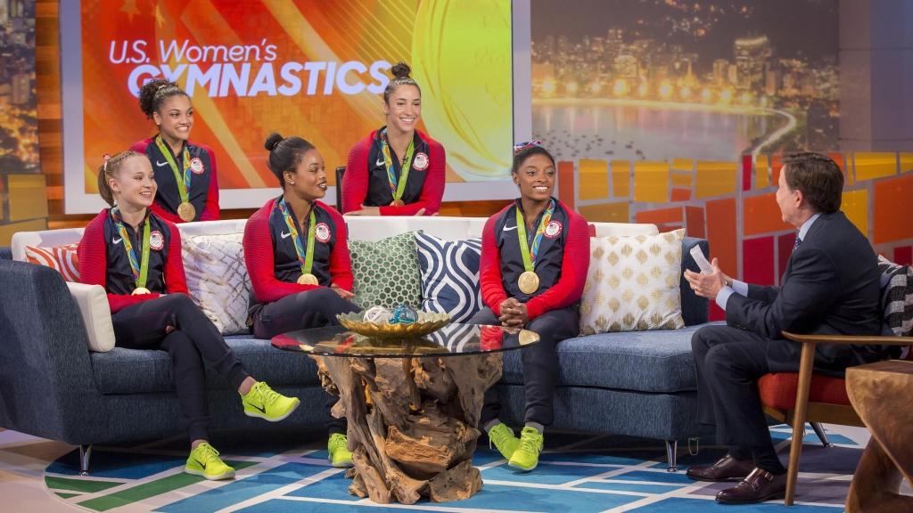 NBC's Bob Costas interviews the gold-medal winning U.S. gymnastics team in Rio on Aug. 9. From left Madison Kocian Laurie Hernandez Gabby Douglas Aly Raisman and Simone Biles. NBC broadcast more than 6,000 hours from the games on various platfor