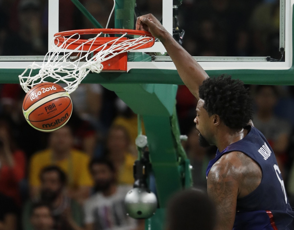 United States&#039 De Andre Jordan dunks against Serbia during the men's gold medal basketball game in Rio on Sunday. The U.S. won 96-66