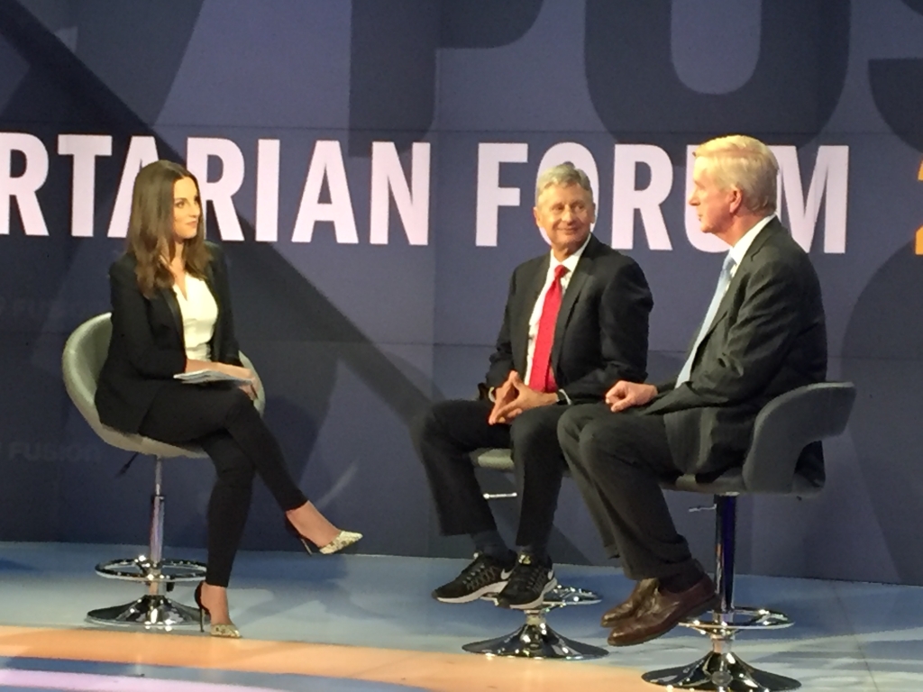 Univision host Alicia Menendez with Libertarian presidential candidate Gary Johnson and running mate William Weld