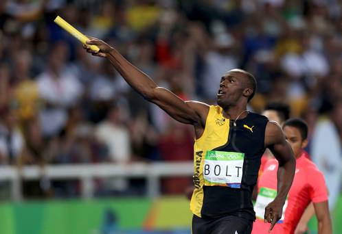 Usain Bolt of Jamaica celebrates winning the gold. REUTERS  Ueslei Marcelino