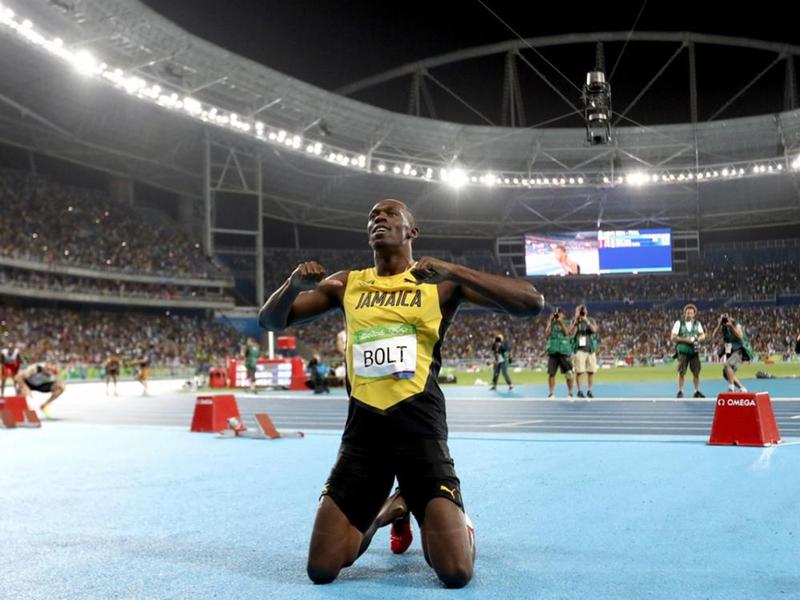 Usain Bolt celebrates winning the 200m gold at Rio 2016