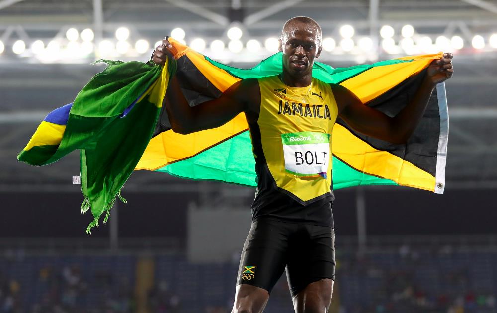 Usain Bolt wins third straight gold medal in 200m to keep unique 'triple triple&#39 bid alive