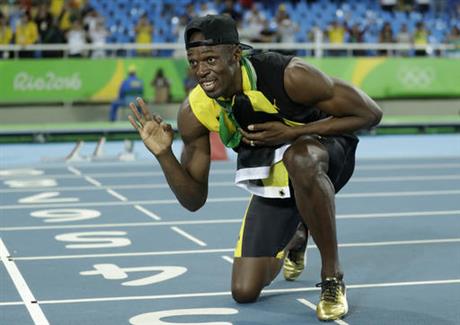 Jamaica's Usain Bolt celebrates winning the gold medal in the men's 4 x 100-meter relay final during the athletics competitions of the 2016 Summer Olympics at the Olympic stadium in Rio de Janeiro Brazil Friday Aug. 19 2016. (AP