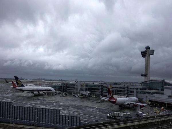 Medical teams at New York's JFK airport armed with Ebola questionnaires and temperature guns began screening travelers from three West African countr