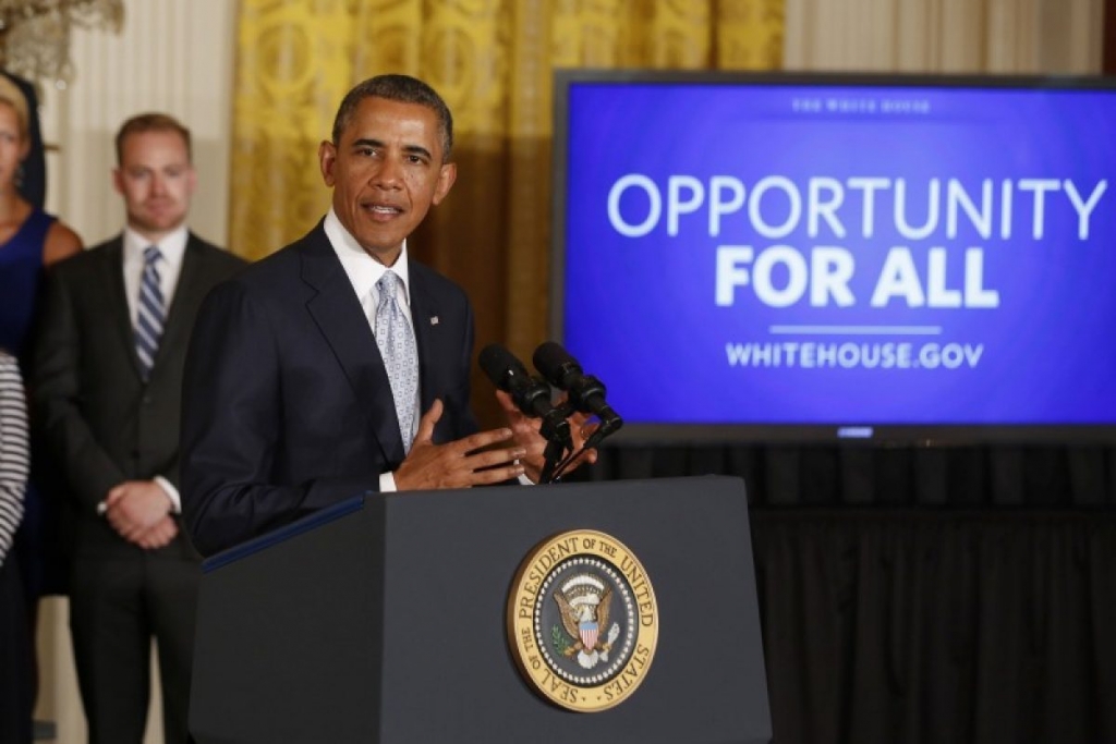 U.S. President Barack Obama speaks before he signs a presidential memorandum on reducing the burden of student loan debt in the East Room of the White House in Washington