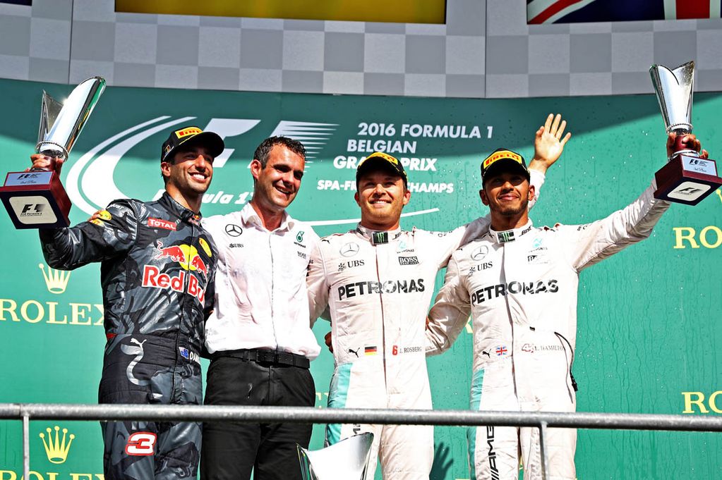 Top three finishers Nico Rosberg Daniel Ricciardo and Lewis Hamilton