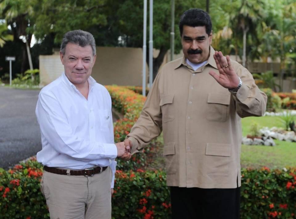 Colombian President Juan Manuel Santos and Venezuelan President Nicolas Maduro after their meeting in Venezuela this week