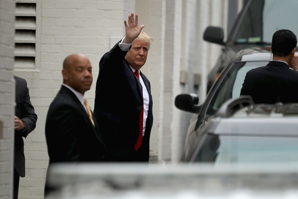 WASHINGTON DC- MAY 12 Republican presidential candidate Donald Trump arrives at Republican National Committee headquarters on Capitol Hill ahead of a meeting with RNC Chairman Reince Priebus Speaker of the House Paul Ryan and GOP House leadersh