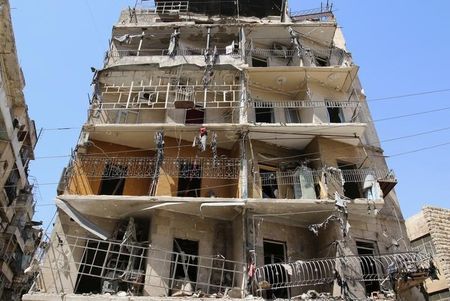 A view shows a damaged building in Tariq al Bab neighborhood of Aleppo