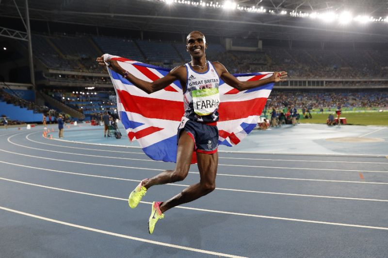 Britain's Mo Farah celebrates winning the Men's 5000m Final