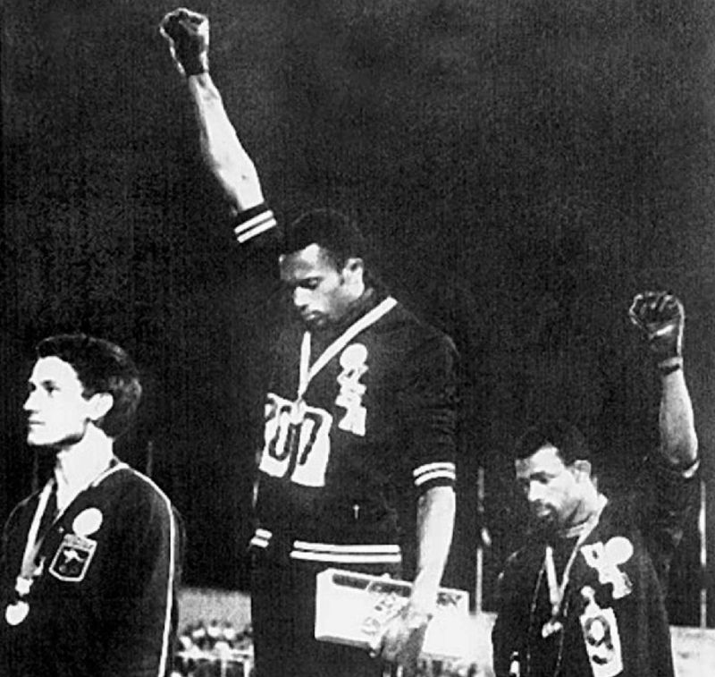 US athletes Tommie Smith and John Carlos raise clenched fists during the US anthem at the Mexico Olympics in 1968