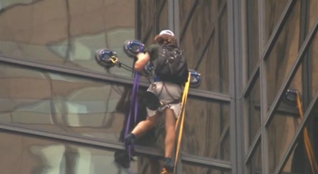 Man is trying to scale Trump Tower in NYC using suction cups