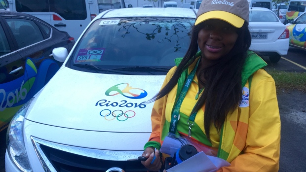 Volunteer Aisha Marcelina is ready to start her shift at 6 a.m. about two hours after she left home