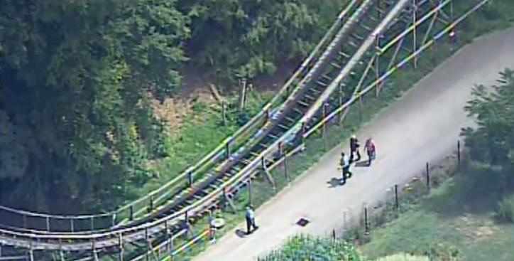 Emergency crew near roller coaster at Idlewild and Soak Zone where a child fell from the ride