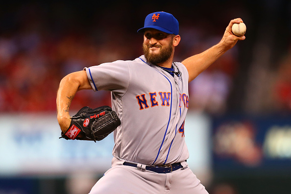 ST. LOUIS MO- AUGUST 24 Starter Jonathon Niese #49 of the New York Mets pitches against the St. Louis Cardinals in the first inning at Busch Stadium