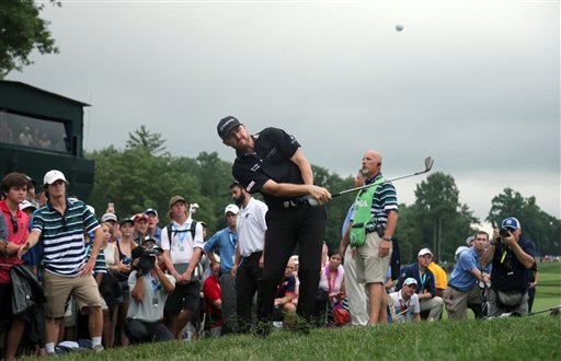 Jimmy Walker chips to the 18th green during the final round of the PGA Championship golf tournament at Baltusrol Golf Club in Springfield N.J. Sunday