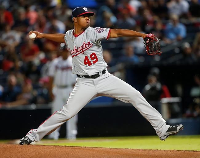 Washington Nationals starting pitcher Reynaldo Lopez works against the Atlanta Braves in the first inning of a baseball game in Atlanta Thursday Aug. 18 2016