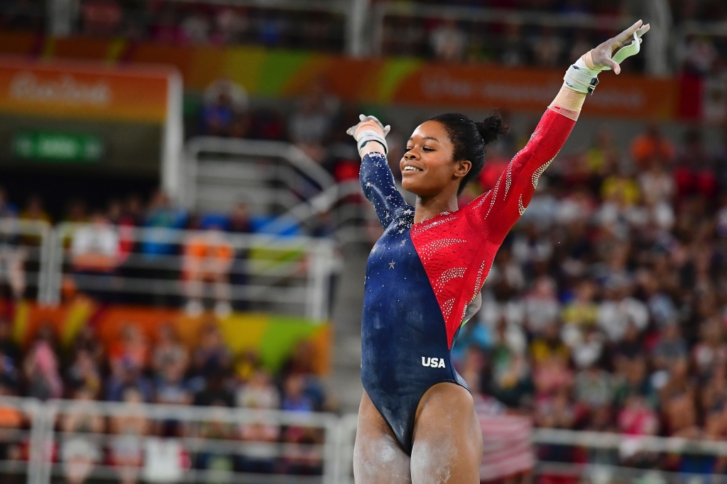 Gymnast Gabby Douglas competes in the qualifying event for the women’s uneven bars during the Rio 2016 Olympic Games in Rio de Janeiro on Aug. 7 2016