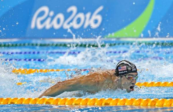 Phelps beaten by 21-year-old in 100 fly