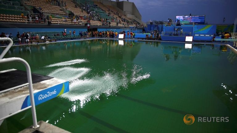 Olympics-Diving-Swimming pool's green hue stokes puzzlement