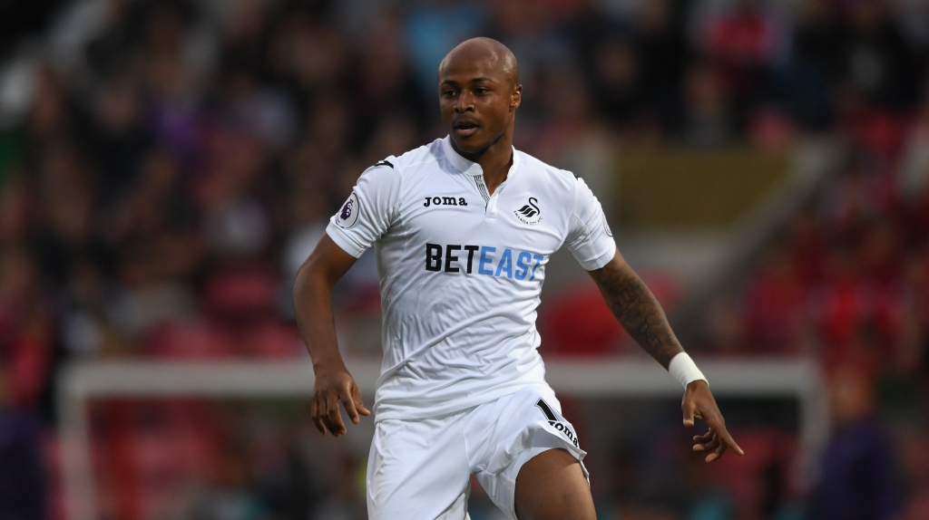 SWINDON ENGLAND- JULY 27 Andre Ayew of Swansea City in action during the Pre Season friendly between Swindon Town and Swansea City at County Ground