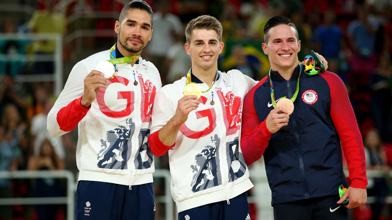 Whitlock and Smith alongside bronze medallist Alexander Naddour