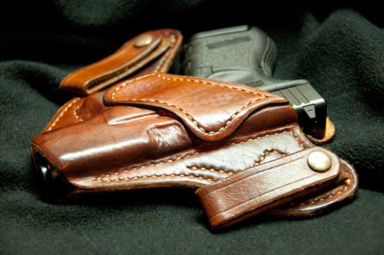 A concealed gun inside a holster