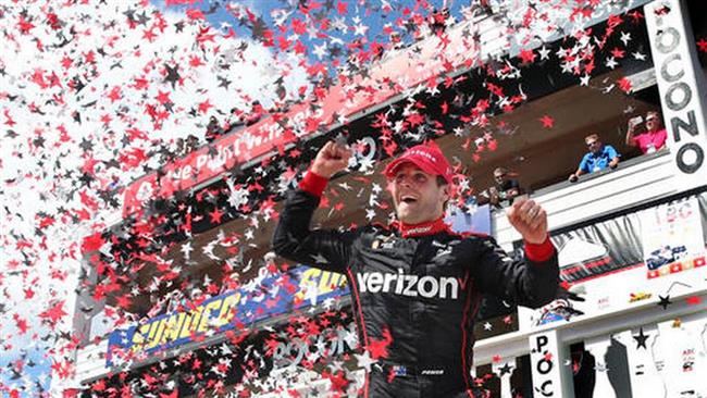 Will Power of Australia celebrates in Victory Lane after winning the Pocono Indy Car 500 auto race