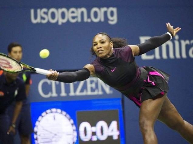 US Serena Williams hits a return to Ekaterina Makarova of Russia during their 2016 US Open women's singles match at the USTA Billie Jean King National Tennis Center in New York on Tuesday