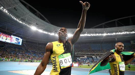 Usain Bolt of Jamaica celebrates after winning the Men's 4 x 100m Relay Final on Day 14 of the Rio 2016 Olympic Games at the Olympic Stadium