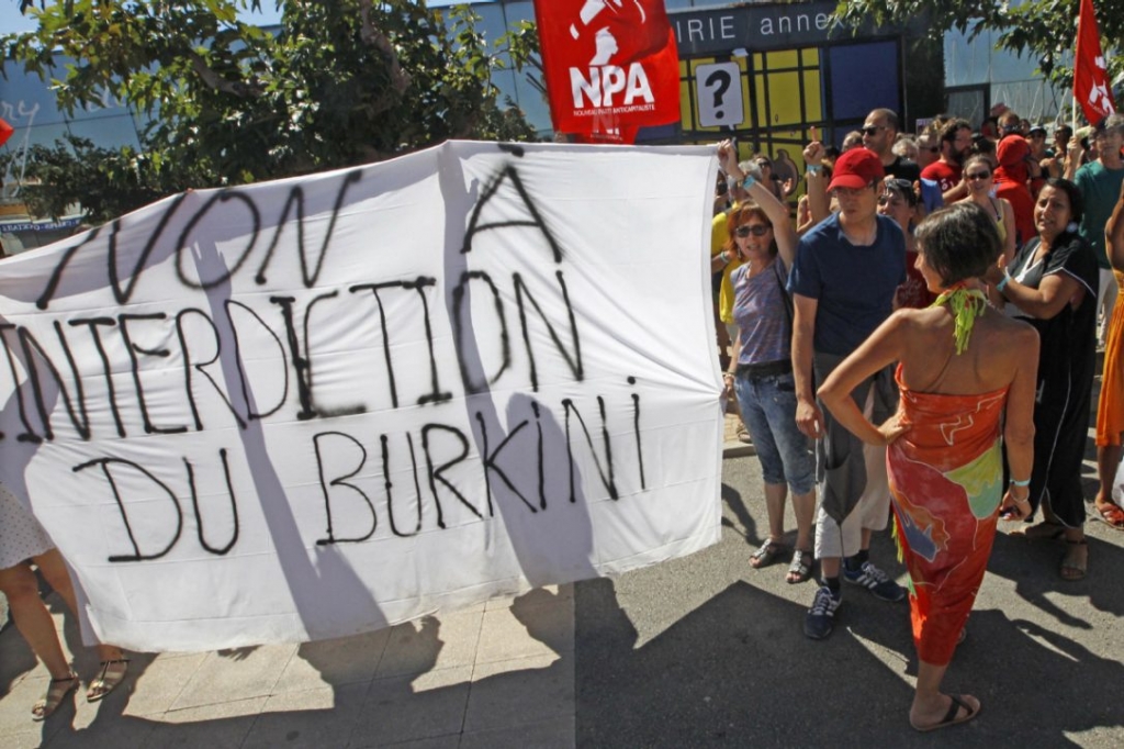 People in the Mediterranean seaside town of Port-Leucate France protest a municipal ban forbidding the wearing of Burkinis