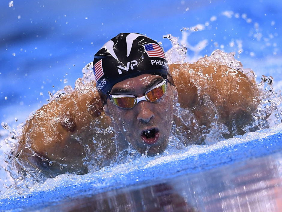 USA's Michael Phelps competes in the Men's 200m Butterfly Semifinal