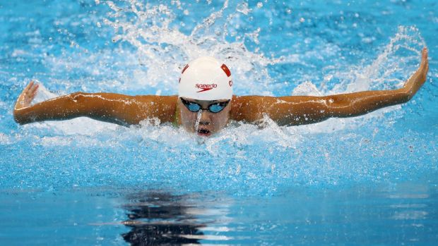 Xinyi Chen of China competes in heat four of the Women's 100m Butterfly