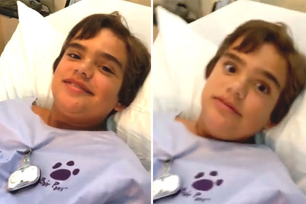 Young lad squeaks from his hospital bed after inhaling dog toy