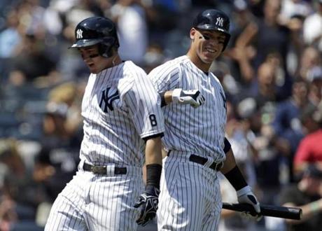 Aug 13 2016 Bronx NY USA New York Yankees right fielder Tyler Austin is congratulated by Aaron Judge after hitting a solo home run during the second inning against the Tampa Bay Rays at Yankee Stadium. Mandatory Credit Adam Hunger-USA TODA