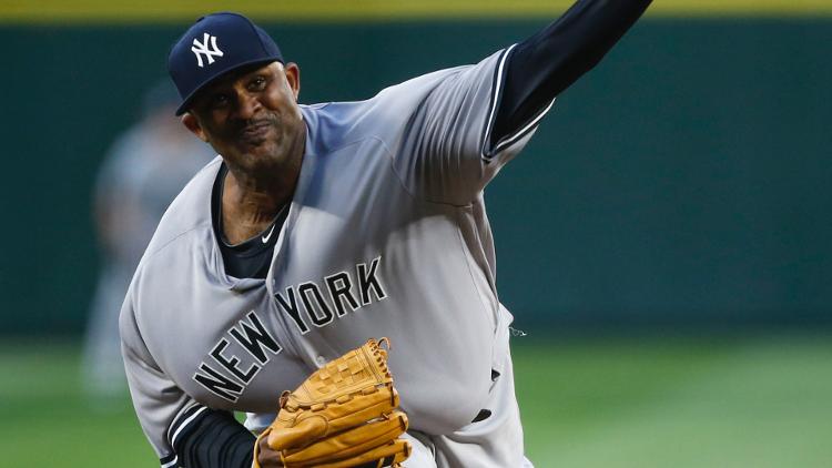 New York Yankees starting pitcher CC Sabathia throws against the Seattle Mariners during the second inning at Safeco Field