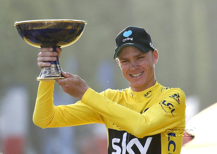 Yellow jersey leader and overall winner Team Sky rider Chris Froome of Britain reacts