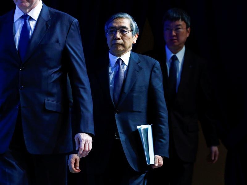 Governor of the Bank of Japan Haruhiko Kuroda arrives for the session 'The Global Economic Outlook&#039 in the Swiss mountain resort of Davos Switzerland