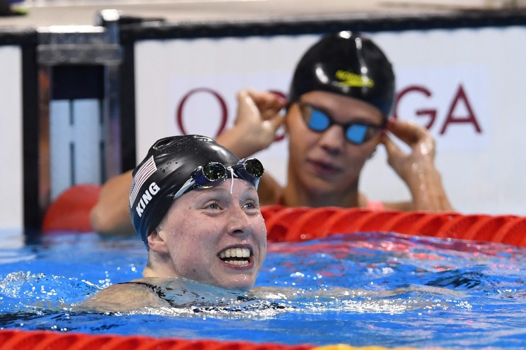 Yulia Efimova looks on as Lilly King celebrates her gold medal in the 100m