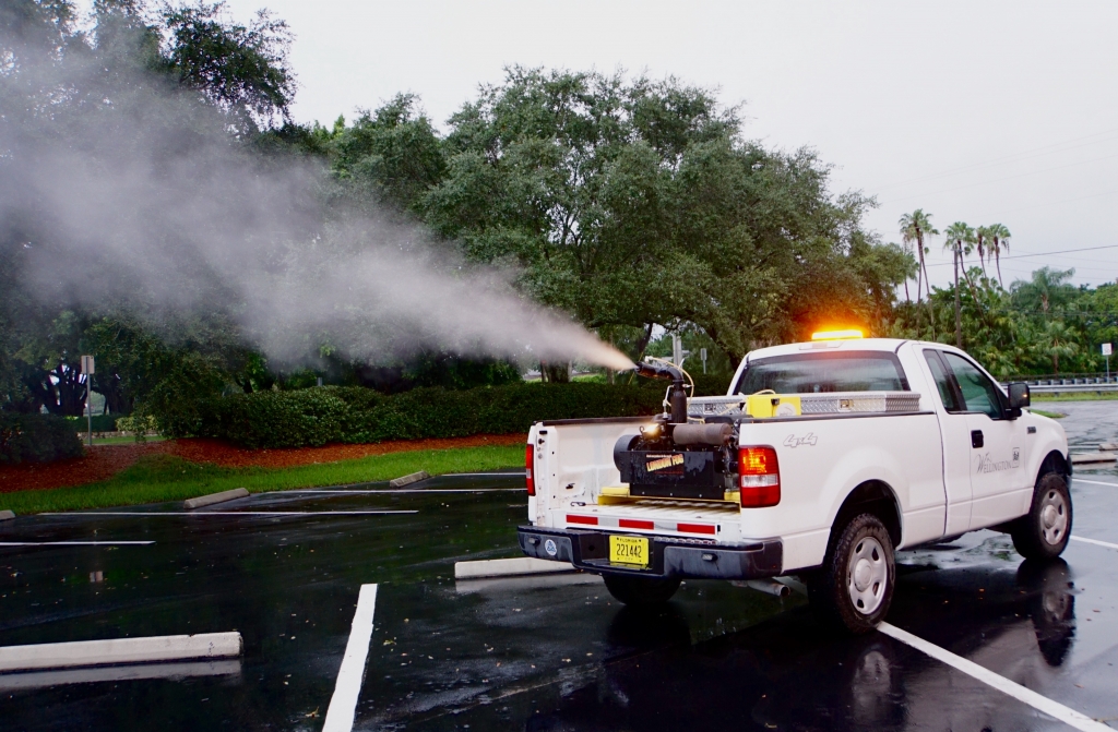 Alex Palacios tests his mosquito spraying truck outside the Village of Wellington Public Works Department